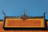 Luang Prabang, Laos - Wat Sene, the sim, the beautiful multi-tiered roof covered with tiles shining under the sun. 